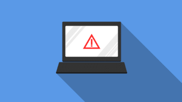 An image of a laptop with an exclamation mark on the screen and a danger icon