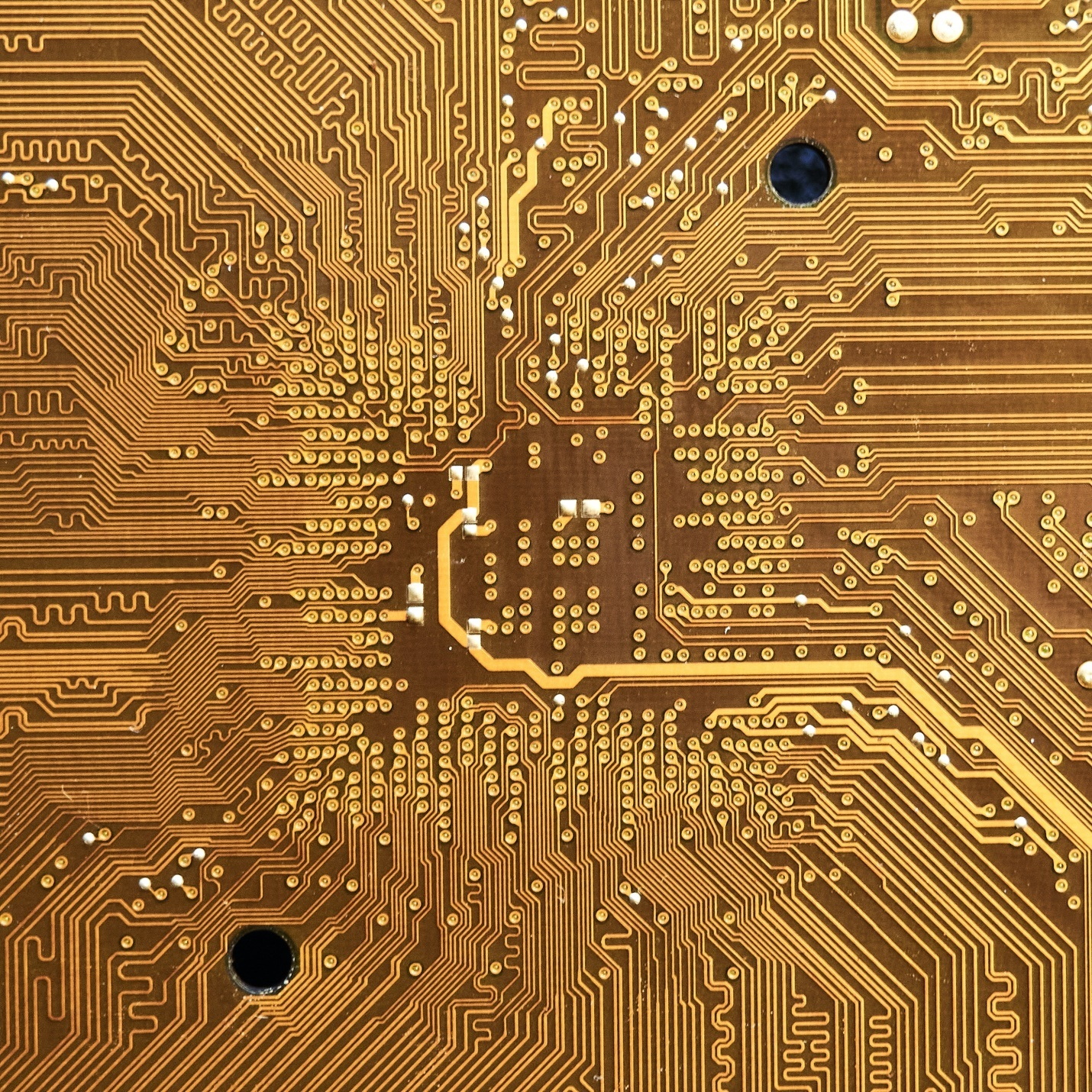 a close-up of a gold computer chip 